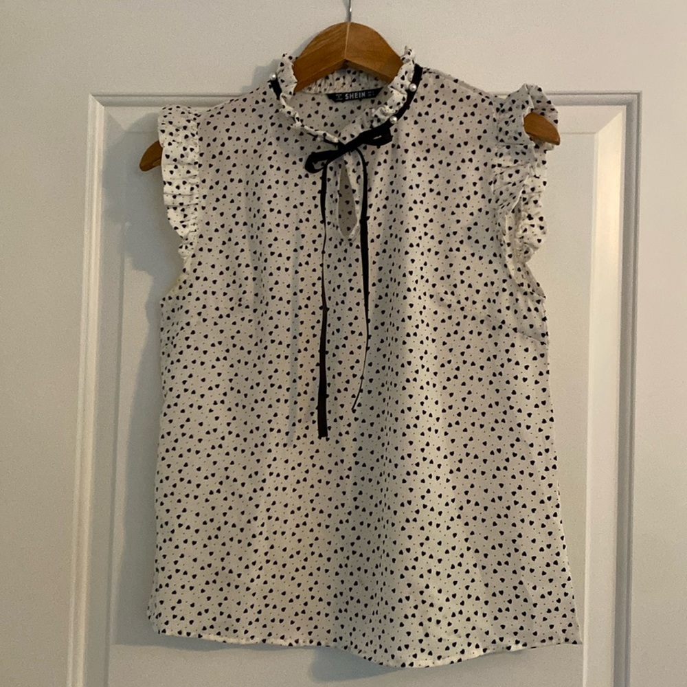 SHEIN heart pattern blouse with pearl detail along neckline.